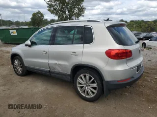 2013 Volkswagen Tiguan SE z VIN WVGBV7AX0DW539618, wystawiony jako Copart lot #71529804 z przebiegiem 148 362 mil mil oraz Szkoda całkowita • Salvage title. Historia ofert i sprzedaży dostępna na DreamBid. Obrazek 2.