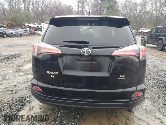 2018 Toyota RAV4 LE with VIN 2T3BFREV5JW754945, listed as a Copart auction lot 50298355 with 67,991 mi miles and Salvage Title. Bid and sale history available at DreamBid. Image 6.