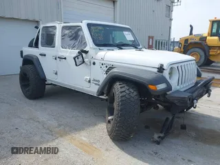 2018 Jeep Wrangler Unlimited Sport with VIN 1C4HJXDG9JW221353, listed as a IAAI auction lot 42419985 with 115,783 mi miles and . Bid and sale history available at DreamBid. Image 1.