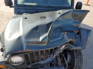 2003 Jeep Wrangler Sahara with VIN 1J4FA59S93P376775, listed as a Copart auction lot 53979415 with 93,995 mi miles and Salvage title. Bid and sale history available at DreamBid. Image 11.