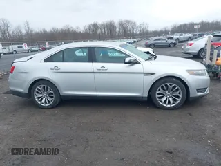 2014 Ford Taurus Limited with VIN 1FAHP2F81EG123933, listed as a IAAI auction lot 41843301 with 111,629 mi miles. Bid and sale history available at carsss.com. Image 13.