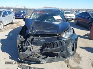 2019 Kia Sportage LX with VIN KNDPM3AC4K7534271, listed as a IAAI auction lot 41696261 with 71,386 mi miles. Bid and sale history available at carsss.com. Image 12.