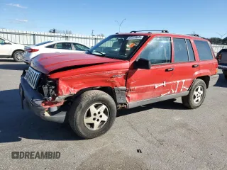 1994 Jeep Grand Cherokee Laredo with VIN 1J4GZ58S8RC254097, listed as a Copart auction lot 47379645 with 240,739 mi miles and Salvage Title. Bid and sale history available at carsss.com. Image 1.