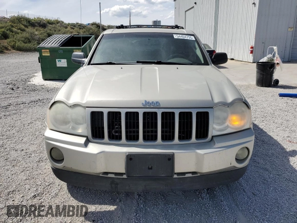 2007 Jeep Grand Cherokee Laredo z VIN 1J8GR48K17C596514, wystawiony jako Copart lot #54404755 z przebiegiem 230 033 mil mil oraz Szkoda całkowita • Salvage title. Historia ofert i sprzedaży dostępna na DreamBid. Obrazek 5.