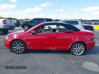 2013 Volkswagen Eos Komfort with VIN WVWBW8AH9DV008763, listed as a IAAI auction lot 41893700 with 53,766 mi miles and . Bid and sale history available at DreamBid. Image 14.