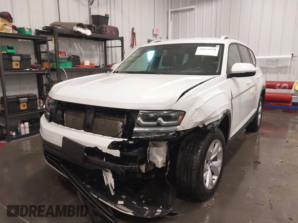 2018 Volkswagen Atlas SE with VIN 1V2KR2CA7JC574270, listed as a IAAI auction lot 41654110 with 104,440 mi miles and . Bid and sale history available at DreamBid. Image 6.