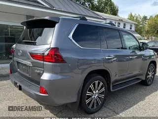 2020 Lexus LX with VIN JTJDY7AX0L4313221, listed as a IAAI auction lot 41368150 with 127,142 mi miles. Bid and sale history available at carsss.com. Image 4.