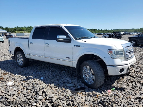 2013 Ford F-150 XLT with VIN 1FTFW1E65DFA84587, listed as a Copart auction lot 69295264 with 216,967 mi miles and Salvage Title. Bid and sale history available at carsss.com. Image 4.