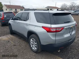 2021 Chevrolet Traverse LT Leather with VIN 1GNERHKW3MJ214421, listed as a IAAI auction lot 42026355 with 999,999 mi miles. Bid and sale history available at carsss.com. Image 3.