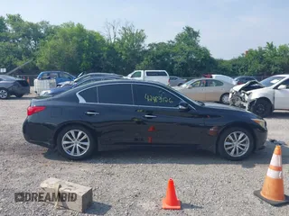 2015 Infiniti Q50 Premium z VIN JN1BV7AR6FM419099, wystawiony jako IAAI lot #42483126 z przebiegiem 100 960 mil mil oraz . Historia ofert i sprzedaży dostępna na DreamBid. Obrazek 14.