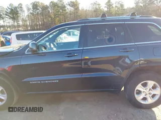 2014 Jeep Grand Cherokee Laredo with VIN 1C4RJEAG3EC218128, listed as a IAAI auction lot 40951611 with 119,596 mi miles and . Bid and sale history available at DreamBid. Image 14.