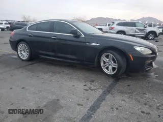 2013 BMW 6 Series 650i with VIN WBA6B2C50DD128323, listed as a Copart auction lot 43059985 with 106,861 mi miles and Clean Title. Bid and sale history available at DreamBid. Image 4.