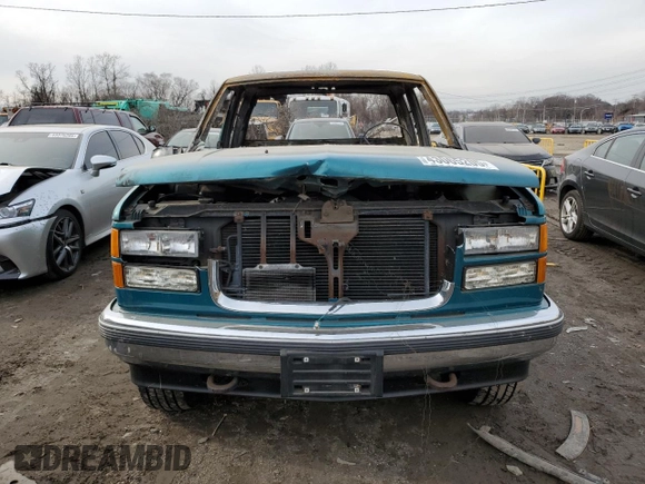 1995 GMC Sierra 1500 z VIN 2GTEK19K0S1570324, wystawiony jako Copart lot #43065205 z przebiegiem Nie podano mil oraz Szkody całkowita. Historia ofert i sprzedaży dostępna na DreamBid. Obrazek 5.