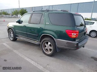 2004 Toyota Sequoia SR5 with VIN 5TDZT34A84S225563, listed as a IAAI auction lot 41601550 with 213,959 mi miles. Bid and sale history available at carsss.com. Image 3.