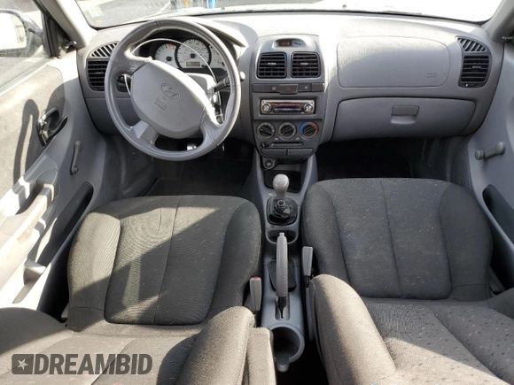 2005 Hyundai Accent GLS z VIN KMHCG35C35U364132, wystawiony jako Copart lot #47227385 z przebiegiem 177 143 mil mil oraz Szkoda całkowita • Salvage title. Historia ofert i sprzedaży dostępna na DreamBid. Obrazek 8.