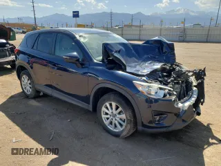 2016 Mazda CX-5 Touring z VIN JM3KE4CY8G0758947, wystawiony jako Copart lot #53140005 z przebiegiem 47 172 mil mil oraz Szkoda całkowita • Salvage title. Historia ofert i sprzedaży dostępna na DreamBid. Obrazek 4.