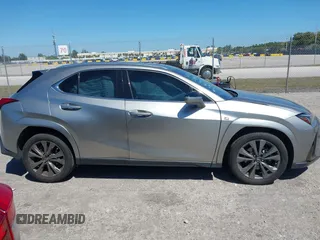 2022 Lexus UX 200 F Sport with VIN JTHE3JBH3N2056014, listed as a IAAI auction lot 41832434 with 25,693 mi miles and . Bid and sale history available at DreamBid. Image 14.