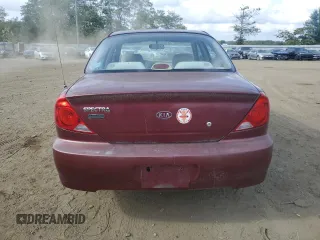 2003 Kia Spectra with VIN KNAFB121935241589, listed as a Copart auction lot 71933194 with 61,738 mi miles and Salvage Title. Bid and sale history available at DreamBid. Image 6.