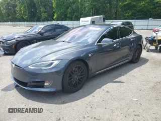 2017 Tesla Model S 100D с VIN 5YJSA1E24HF191280, выставлен на аукционе Copart как лот 62598095 с пробегом 57 262 миль миль и Чистый • Clean title. История ставок и продаж доступна на DreamBid. Изображение 1.