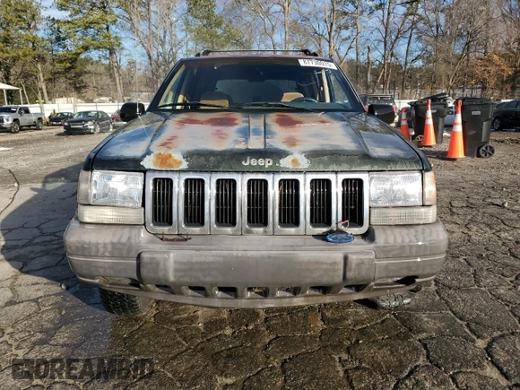 1996 Jeep Grand Cherokee with VIN 1J4EZ58S9TC148692, listed as a Copart auction lot 87730075 with Not provided miles and Salvage title. Bid and sale history available at DreamBid. Image 5.