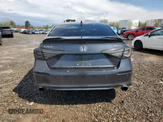2022 Honda Civic Touring z VIN 2HGFE1F91NH304319, wystawiony jako Copart lot #55896485 z przebiegiem 56 476 mil mil oraz Szkody całkowita. Historia ofert i sprzedaży dostępna na DreamBid. Obrazek 6.