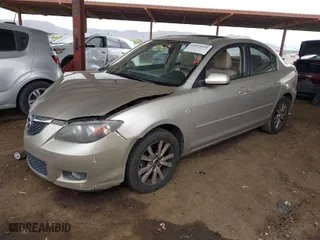 2007 Mazda Mazda3 i Sport with VIN JM1BK12FX71660075, listed as a IAAI auction lot 41923092 with 130,064 mi miles. Bid and sale history available at carsss.com. Image 2.
