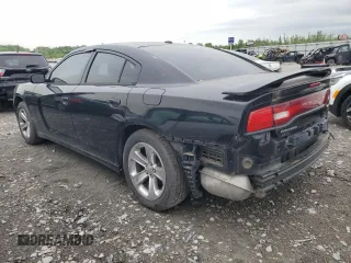 2013 Dodge Charger SXT z VIN 2C3CDXHG6DH525694, wystawiony jako Copart lot #54911495 z przebiegiem 189 992 mil mil oraz Szkoda całkowita • Salvage title. Historia ofert i sprzedaży dostępna na DreamBid. Obrazek 2.