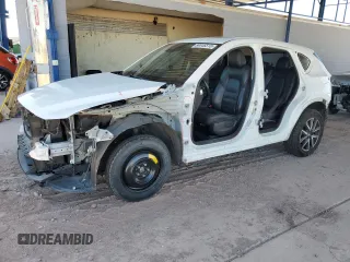 2018 Mazda CX-5 Grand Touring z VIN JM3KFADM9J0310442, wystawiony jako Copart lot #54446515 z przebiegiem 51 754 mil mil oraz Szkoda całkowita • Salvage title. Historia ofert i sprzedaży dostępna na DreamBid. Obrazek 1.