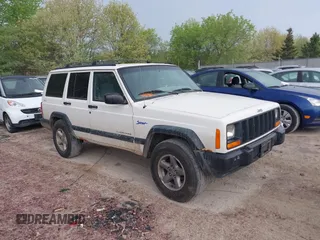 1997 Jeep Cherokee Sport with VIN 1J4FJ68S1VL592797, listed as a IAAI auction lot 42217241 with 215,452 mi miles and . Bid and sale history available at DreamBid. Image 1.