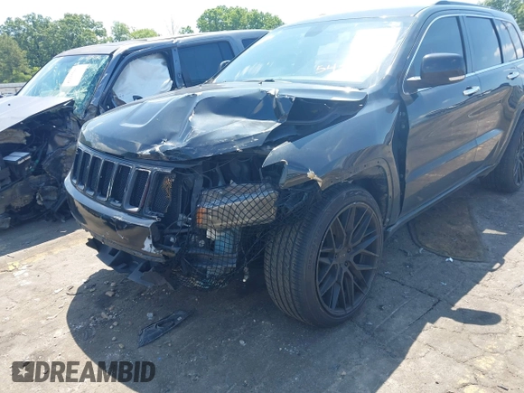 2014 Jeep Grand Cherokee Limited with VIN 1C4RJFBG3EC545861, listed as a IAAI auction lot 42216743 with 160,000 mi miles and . Bid and sale history available at DreamBid. Image 6.