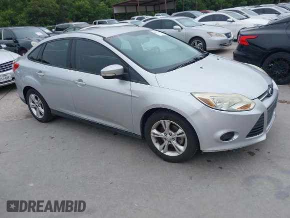 2013 Ford Focus SE z VIN 1FADP3F25DL189133, wystawiony jako IAAI lot #42438118 z przebiegiem 122 350 mil mil oraz . Historia ofert i sprzedaży dostępna na DreamBid. Obrazek 1.