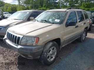 2000 Jeep Grand Cherokee Laredo with VIN 1J4GW48S3YC347711, listed as a IAAI auction lot 42305308 with Not provided miles and . Bid and sale history available at DreamBid. Image 2.