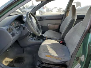 1995 Toyota Tercel DX z VIN JT2EL56E2S7019018, wystawiony jako Copart lot #84929224 z przebiegiem 241 078 mil mil oraz Szkoda całkowita • Salvage title. Historia ofert i sprzedaży dostępna na DreamBid. Obrazek 7.
