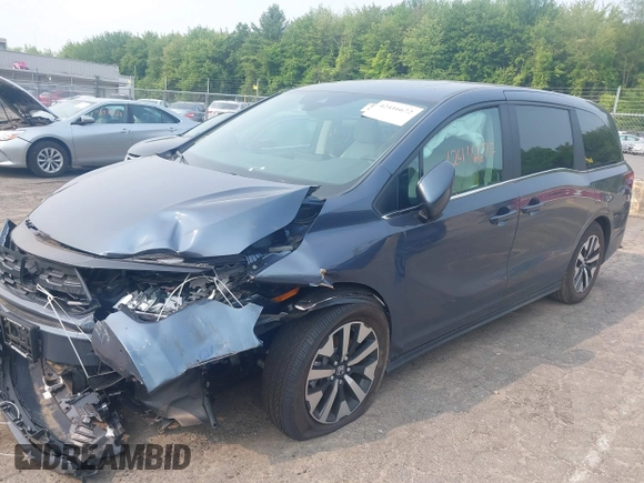 2025 Honda Odyssey EX-L z VIN 5FNRL6H68SB018745, wystawiony jako IAAI lot #42416672 z przebiegiem 6 019 mil mil oraz . Historia ofert i sprzedaży dostępna na DreamBid. Obrazek 18.