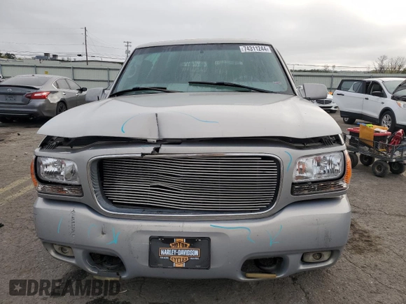 2000 GMC Denali z VIN 1GKEK13RXYR110436, wystawiony jako Copart lot #74311244 z przebiegiem 250 735 mil mil oraz Szkody całkowita. Historia ofert i sprzedaży dostępna na DreamBid. Obrazek 5.