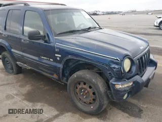 2002 Jeep Liberty Limited z VIN 1J4GL58K12W193732, wystawiony jako IAAI lot #42135719 z przebiegiem 169 436 mil mil oraz . Historia ofert i sprzedaży dostępna na DreamBid. Obrazek 1.