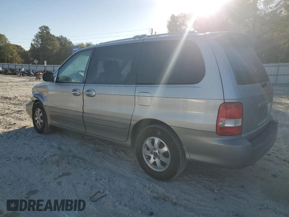 2004 Kia Sedona LX with VIN KNDUP131346508490, listed as a Copart auction lot 77391594 with 41,211 mi miles and Salvage Title. Bid and sale history available at carsss.com. Image 2.