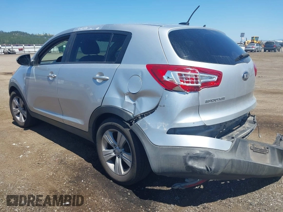 2013 Kia Sportage LX with VIN KNDPBCA24D7352828, listed as a IAAI auction lot 42685744 with 156,805 mi miles and . Bid and sale history available at DreamBid. Image 3.