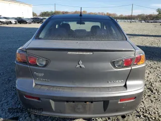 2014 Mitsubishi Lancer ES with VIN JA32U2FUXEU020225, listed as a Copart auction lot 77856464 with 181,958 mi miles and Salvage Title. Bid and sale history available at DreamBid. Image 6.
