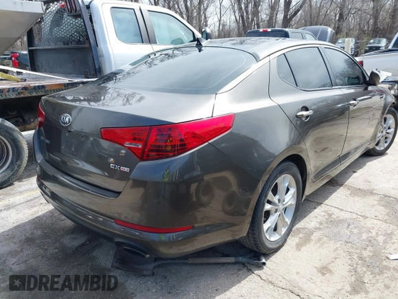2013 Kia Optima EX with VIN 5XXGN4A77DG234921, listed as a IAAI auction lot 41823669 with 168,460 mi miles. Bid and sale history available at carsss.com. Image 4.