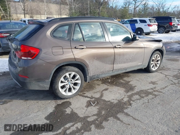 2014 BMW X1 xDrive28i with VIN WBAVL1C56EVY19340, listed as a IAAI auction lot 41340436 with 85,867 mi miles. Bid and sale history available at carsss.com. Image 4.
