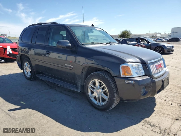 2007 GMC Envoy Denali with VIN 1GKES63M372150236, listed as a Copart auction lot 73612354 with 161,934 mi miles and Salvage Title. Bid and sale history available at carsss.com. Image 4.