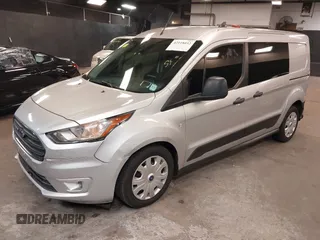 2019 Ford Transit Connect XLT z VIN NM0LS7F22K1408907, wystawiony jako IAAI lot #42118032 z przebiegiem 129 243 mil mil oraz . Historia ofert i sprzedaży dostępna na DreamBid. Obrazek 18.