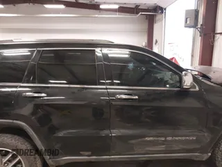 2021 Jeep Grand Cherokee 80th Anniversary with VIN 1C4RJFBG5MC732694, listed as a IAAI auction lot 41410124 with 84,958 mi miles and . Bid and sale history available at DreamBid. Image 14.