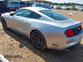 2018 Ford Mustang EcoBoost with VIN 1FA6P8TH8J5121133, listed as a IAAI auction lot 42260938 with 35,166 mi miles and . Bid and sale history available at DreamBid. Image 3.