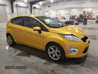 2011 Ford Fiesta SES with VIN 3FADP4FJ7BM114331, listed as a Copart auction lot 52442425 with 54,756 mi miles and Salvage Title. Bid and sale history available at carsss.com. Image 4.