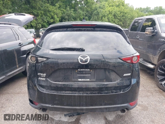 2018 Mazda CX-5 Grand Touring with VIN JM3KFBDM2J0400828, listed as a IAAI auction lot 42540846 with 254,672 mi miles and . Bid and sale history available at DreamBid. Image 16.