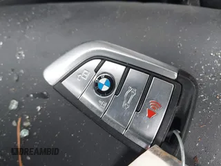 2018 BMW 5 Series M550i xDrive with VIN WBAJB9C53JB286035, listed as a IAAI auction lot 40590380 with 57,072 mi miles and . Bid and sale history available at carsss.com. Image 11.