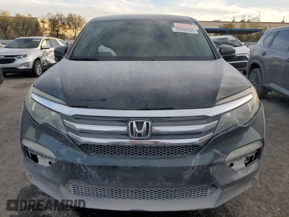2016 Honda Pilot EX-L with VIN 5FNYF6H72GB106385, listed as a Copart auction lot 44000395 with 128,520 mi miles and Salvage Title. Bid and sale history available at carsss.com. Image 5.