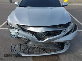 2019 Toyota Camry LE with VIN 4T1B11HK7KU803624, listed as a IAAI auction lot 41589107 with 169,863 mi miles and . Bid and sale history available at DreamBid. Image 6.